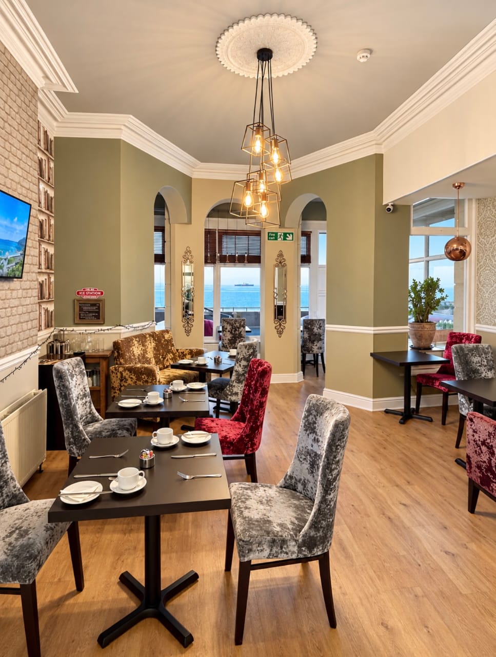 Breakfast room at Atlanta Guest House overlooking Eastbourne seafront